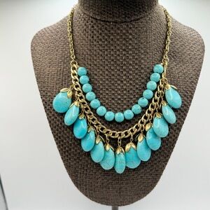 Southwest boho style tiered turquoise howlite and gold tone necklace